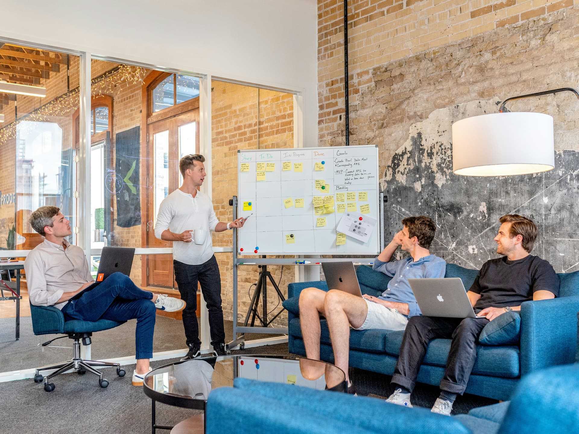 Business mentors providing strategic guidance and resources to a tech startup team